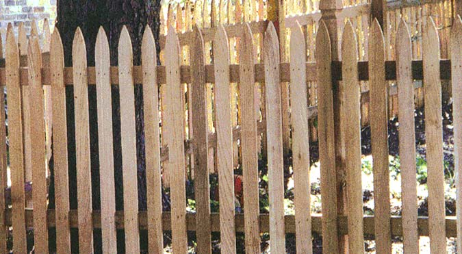 rustic picket fence installation