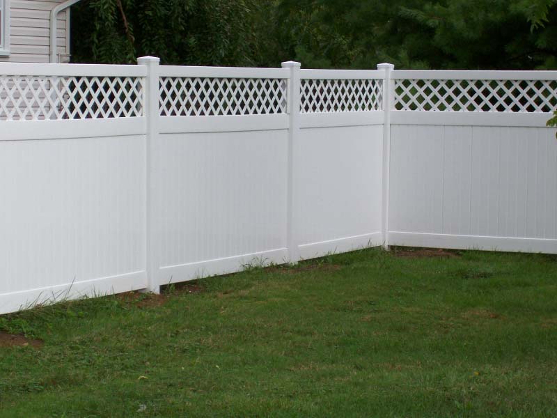 vinyl privacy fence installation with stakes installed in Wauwatosa